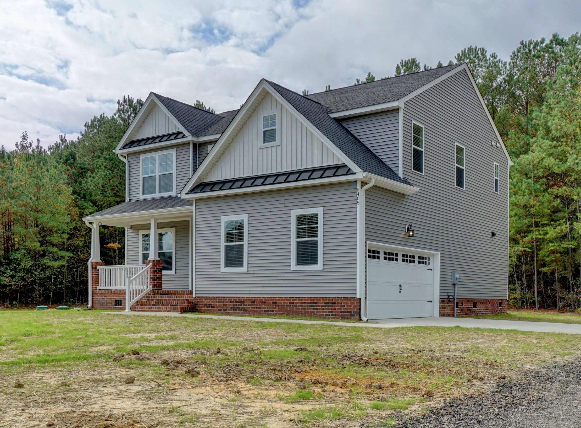 Home Builder in Smithfield VA. The Augusta Exterior Front Grey with Porch and Garage