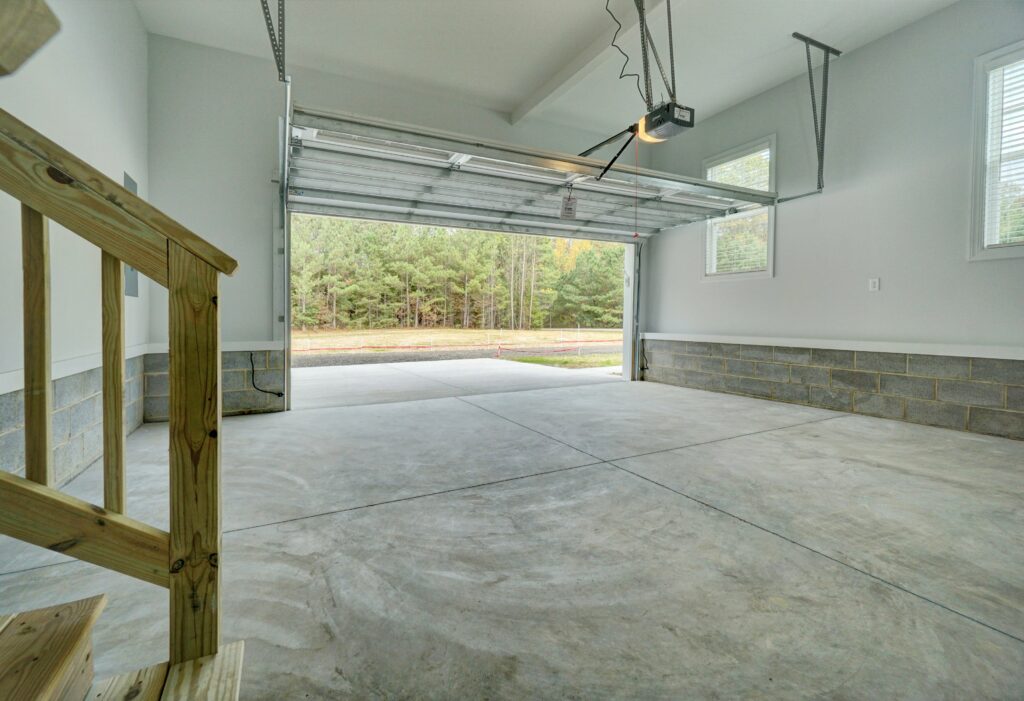 The Augusta 2-Car Garage and Driveway from Garage Stairs