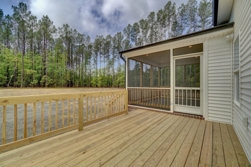 The Grayson Screened-in Porch and Deck with View of Backyard from Deck